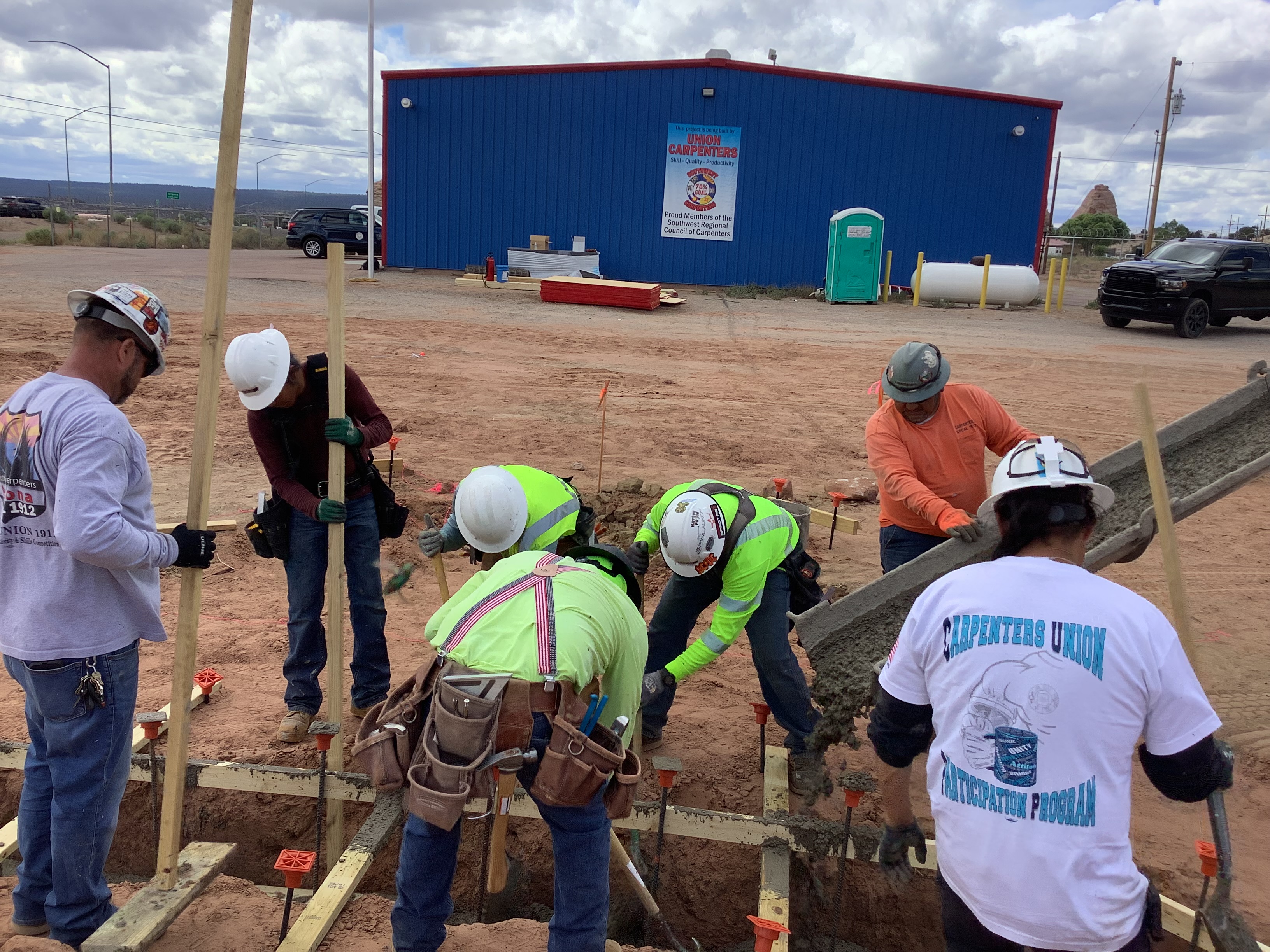 Carpenters construct footings for concrete foundations. 